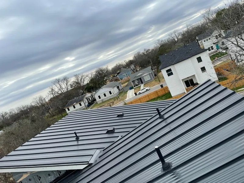 Standing seam metal roof panels with vents for Skylight Repair in Southaven